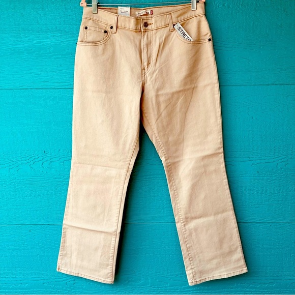 VINTAGE LEVI’S 550 RELAXED BOOT CUT TAN SIZE 12 NWT 2004 - Picture 1 of 10